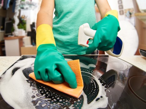Local cleaning team removing building dust from a renovated flat in Lewisham